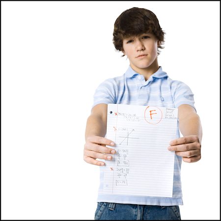 defeated boy - young man showing the grade he received Stock Photo - Premium Royalty-Free, Code: 640-06051392