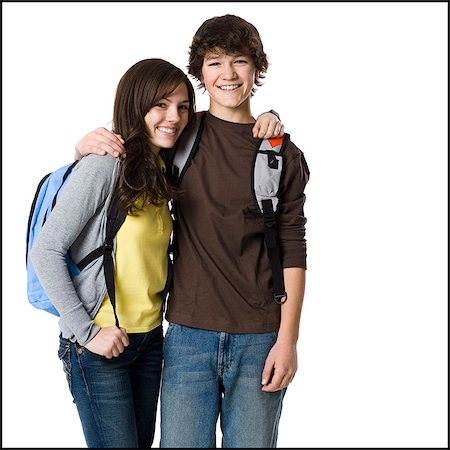 Students with book bags posing Stock Photo - Premium Royalty-Free, Code: 640-06051425