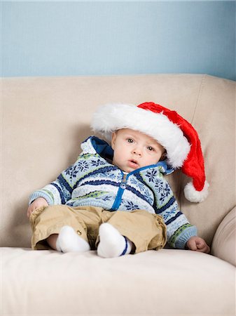 santa claus hat - bébé avec un bonnet de Noël Photographie de stock - Premium Libres de Droits, Code: 640-06051452