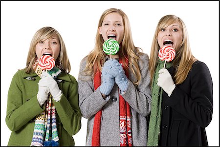 girls with lollipops Stock Photo - Premium Royalty-Free, Code: 640-06051469