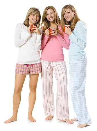 simsearch:640-06051503,k - girls smiling while holding mugs Stock Photo - Premium Royalty-Free, Code: 640-06051505