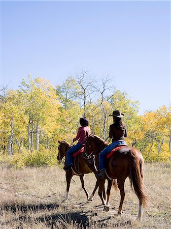 women riding horses Stock Photo - Premium Royalty-Free, Code: 640-06051530