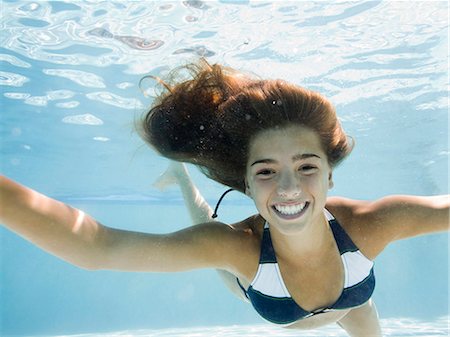 girl in a swimming pool Stock Photo - Premium Royalty-Free, Code: 640-06051614