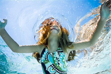 girl in a swimming pool Stock Photo - Premium Royalty-Free, Code: 640-06051617
