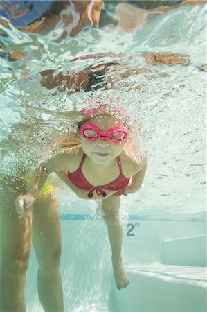 girl in a swimming pool Stock Photo - Premium Royalty-Free, Code: 640-06051613