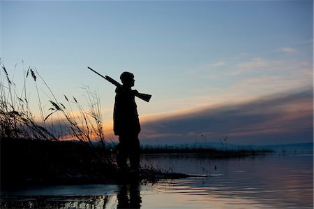 stage at night - man out hunting Stock Photo - Premium Royalty-Free, Code: 640-06051664