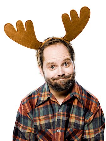 plaid - man in a plaid shirt wearing antlers Stock Photo - Premium Royalty-Free, Code: 640-06051696
