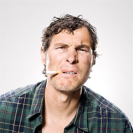 White trash man smoking Foto de stock - Sin royalties Premium, Código: 640-06051714