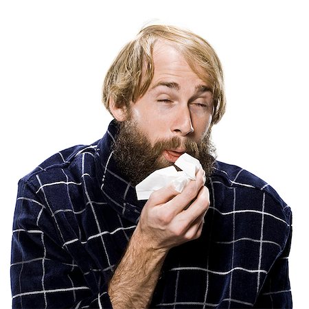 facial tissue - bearded man with a cold wearing a robe Stock Photo - Premium Royalty-Free, Code: 640-06051737