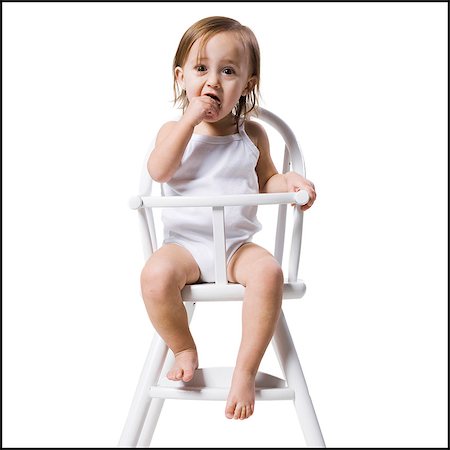 simsearch:640-02949108,k - baby girl in a high chair Foto de stock - Sin royalties Premium, Código: 640-06051792