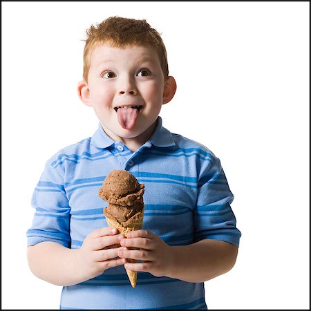 boy holding an ice cream cone Stock Photo - Premium Royalty-Free, Code: 640-06051800