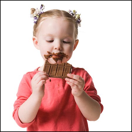 child eating chocolate Stock Photo - Premium Royalty-Free, Code: 640-06051803