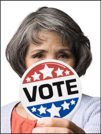 simsearch:640-06051924,k - woman with a "vote" button Stock Photo - Premium Royalty-Free, Code: 640-06051816