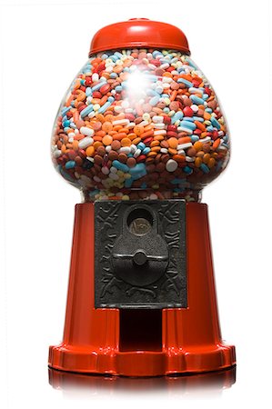 distributore di gomme da masticare - gumball machine full of pills Fotografie stock - Premium Royalty-Free, Codice: 640-06052024