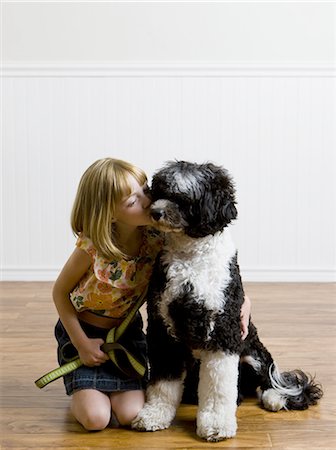 girl and her dog Stock Photo - Premium Royalty-Free, Code: 640-06052042