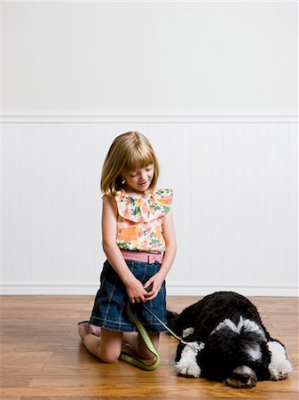 girl and her dog Stock Photo - Premium Royalty-Free, Code: 640-06052043