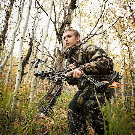 rugged outdoors man - man hunting in the wilderness Stock Photo - Premium Royalty-Free, Code: 640-06052105