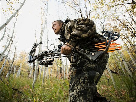 rugged outdoors man - man hunting in the wilderness Stock Photo - Premium Royalty-Free, Code: 640-06052107