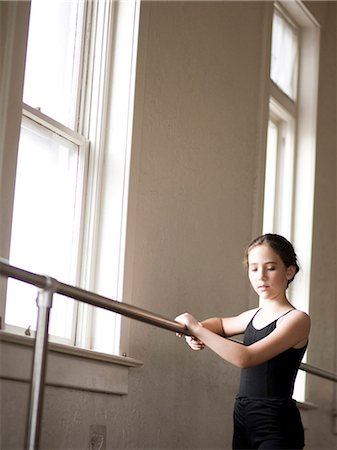 pre teens in leotards - USA,Utah,Springville,Girl ballet dancer (12-13) using railing Stock Photo - Premium Royalty-Free, Code: 640-06052218
