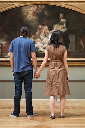 painting of people in a art gallery - France, Paris, Young couple watching paintings in Louvre Museum Stock Photo - Premium Royalty-Free, Code: 640-06963095