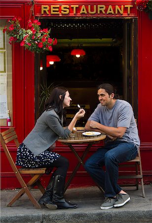 people eating desserts - France, Paris, Young couple sitting in sidewalk cafe Stock Photo - Premium Royalty-Free, Code: 640-06963109