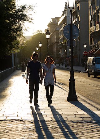 France, Paris, Young couple walking in street Foto de stock - Sin royalties Premium, Código: 640-06963117