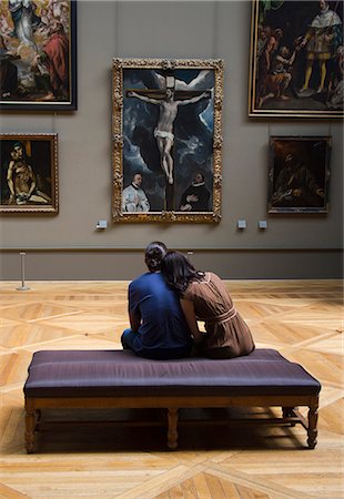 religious illustration - France, Paris, The Louvre, Young couple looking at Christ on the Cross Adored by Donors by El Greco Stock Photo - Premium Royalty-Free, Code: 640-06963125