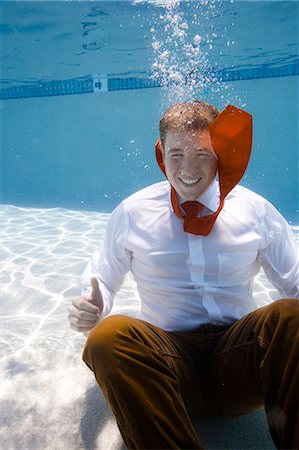 USA, Utah, Orem, Portrait of young groom under water Stock Photo - Premium Royalty-Free, Code: 640-06963269