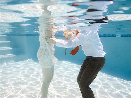 USA, Utah, Orem, Wedding couple under water Foto de stock - Sin royalties Premium, Código: 640-06963276