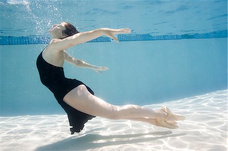 day time underwater - USA, Utah, Orem, Female ballet dancer under water Stock Photo - Premium Royalty-Free, Code: 640-06963349