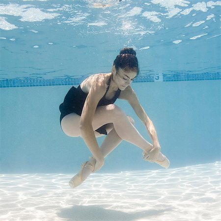 pool ballerina - USA, Utah, Orem, Female ballet dancer under water Stock Photo - Premium Royalty-Free, Code: 640-06963343