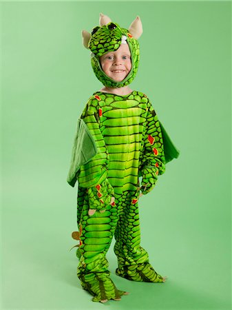 Portrait of boy (2-3) in dragon costume for Halloween Photographie de stock - Premium Libres de Droits, Code: 640-06963599