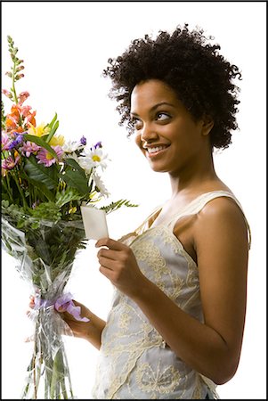 simsearch:640-03260223,k - Woman receiving bouquet of flowers Stock Photo - Premium Royalty-Free, Code: 640-08088956