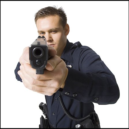 simsearch:640-03262582,k - Male police officer with handgun Stock Photo - Premium Royalty-Free, Code: 640-08089076