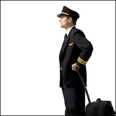 simsearch:640-08089064,k - Profile of male pilot with luggage Photographie de stock - Premium Libres de Droits, Code: 640-08089089