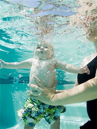 baby in a swimming pool Stock Photo - Premium Royalty-Free, Code: 640-08089156