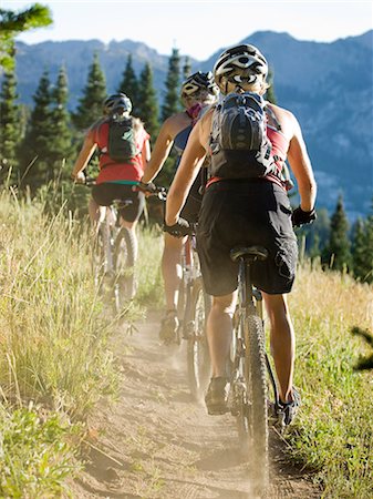 sport bike pic back view - mountain bikers riding along a trail Stock Photo - Premium Royalty-Free, Code: 640-08089189