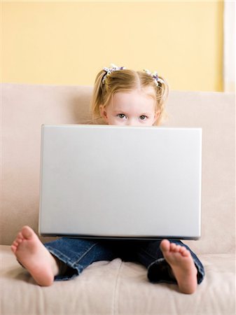 simsearch:640-08089533,k - little girl using a laptop Stock Photo - Premium Royalty-Free, Code: 640-08089324
