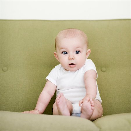 simsearch:640-08089386,k - baby girl on a sofa Stock Photo - Premium Royalty-Free, Code: 640-08089425