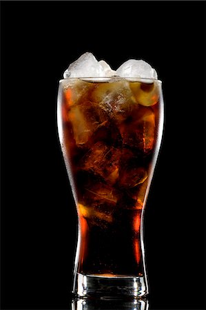 glass of cola with ice Foto de stock - Sin royalties Premium, Código: 640-08089432