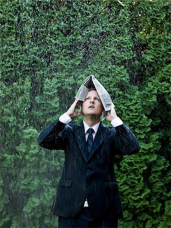 simsearch:640-08089629,k - man in a suit standing next to a sprinkler Stock Photo - Premium Royalty-Free, Code: 640-08089441