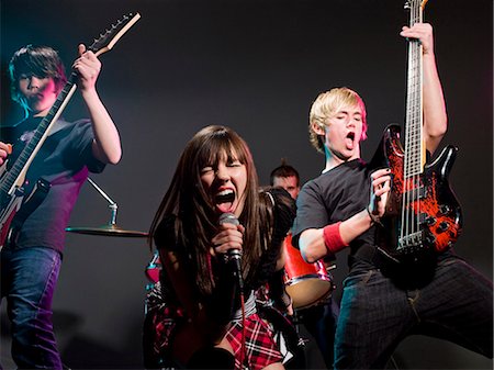 drum (instrument) - teenage rock band Foto de stock - Sin royalties Premium, Código: 640-08089508