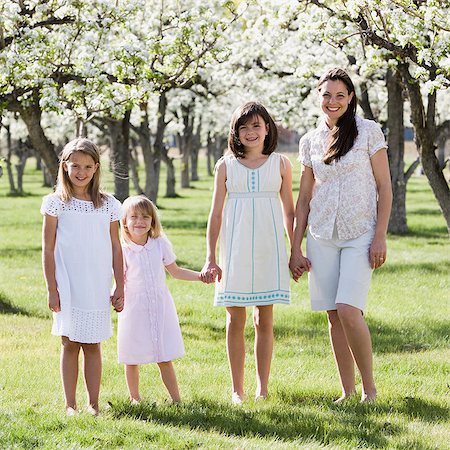 simsearch:640-08089565,k - mother and three daughters in an orchard Stock Photo - Premium Royalty-Free, Code: 640-08089535