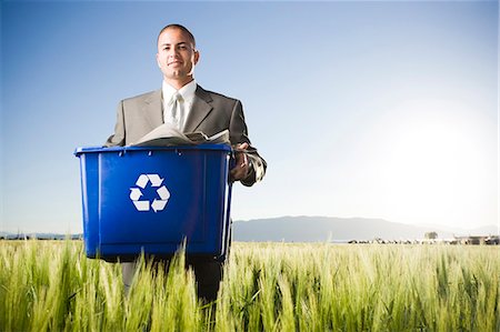 simsearch:640-08089567,k - businessman holding a recycling bin Stock Photo - Premium Royalty-Free, Code: 640-08089569