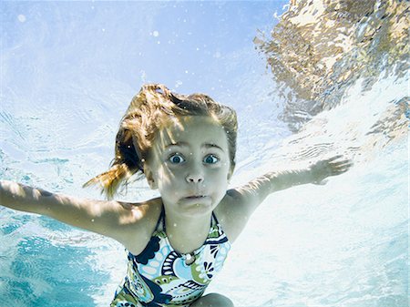 simsearch:640-08089629,k - girl in a swimming pool Stock Photo - Premium Royalty-Free, Code: 640-08089621
