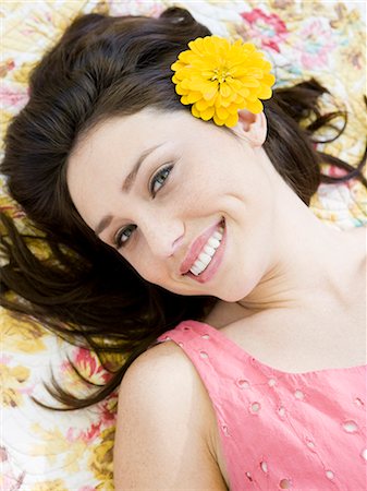 simsearch:640-02953202,k - woman lying on a floral print blanket Stock Photo - Premium Royalty-Free, Code: 640-08089665