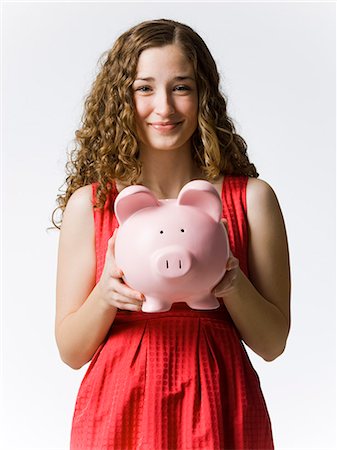 simsearch:614-03903103,k - woman holding a piggybank Foto de stock - Sin royalties Premium, Código: 640-08089728