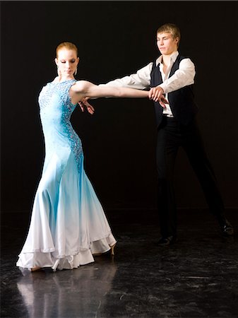 dancing couple young women blond hair - Young man and woman ballroom dancing Stock Photo - Premium Royalty-Free, Code: 640-08089841