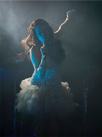 USA, Utah, Provo, female singer on stage Stock Photo - Premium Royalty-Free, Code: 640-08546076