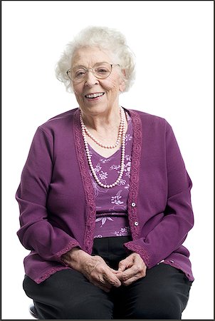 Portrait of a senior woman smiling Stock Photo - Premium Royalty-Free, Code: 640-01348333